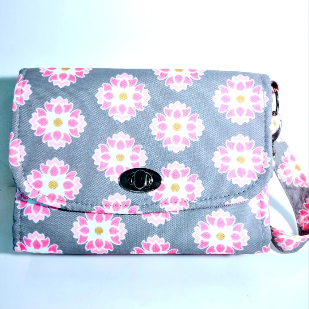 Lilly Bit clutch diaper tags