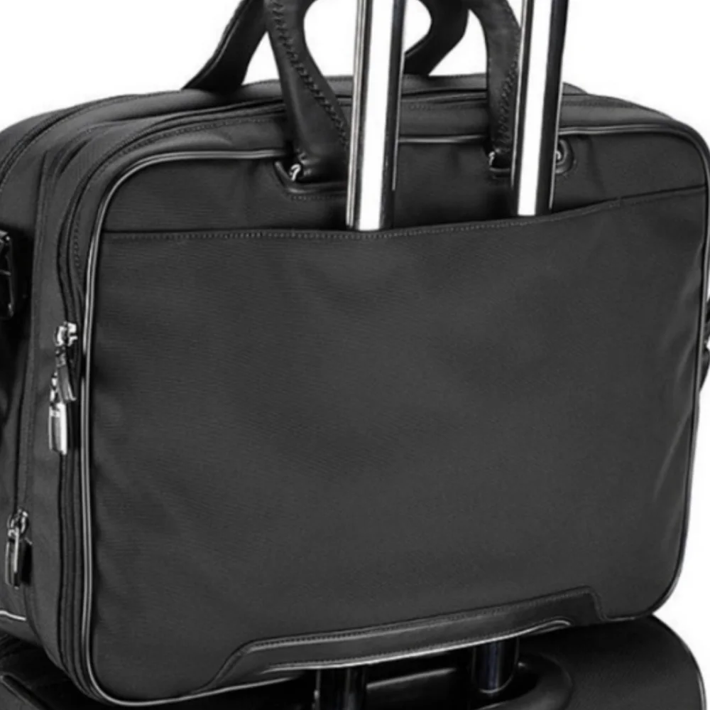 Tumi features slip your