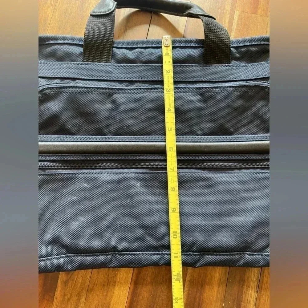 Tumi please 11”