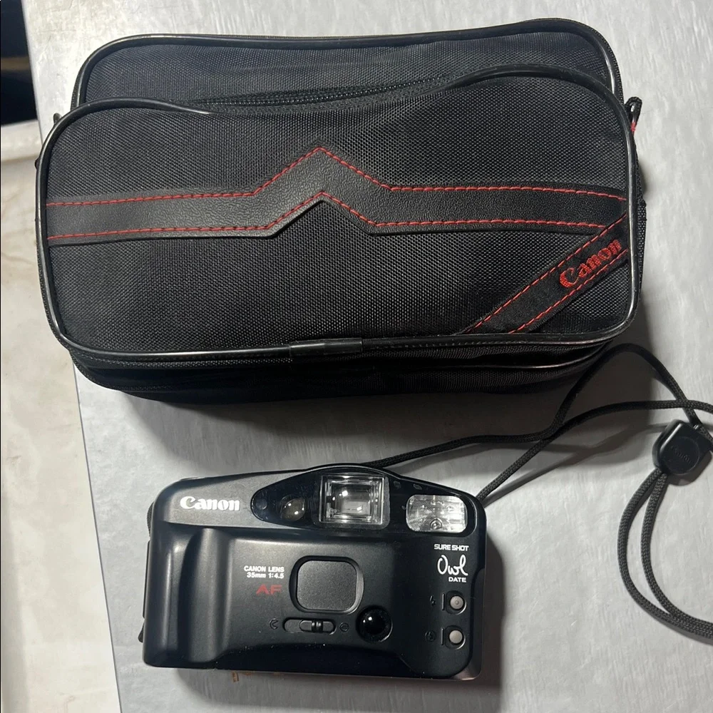 Canon Black 35mm Film Camera with Red Accents