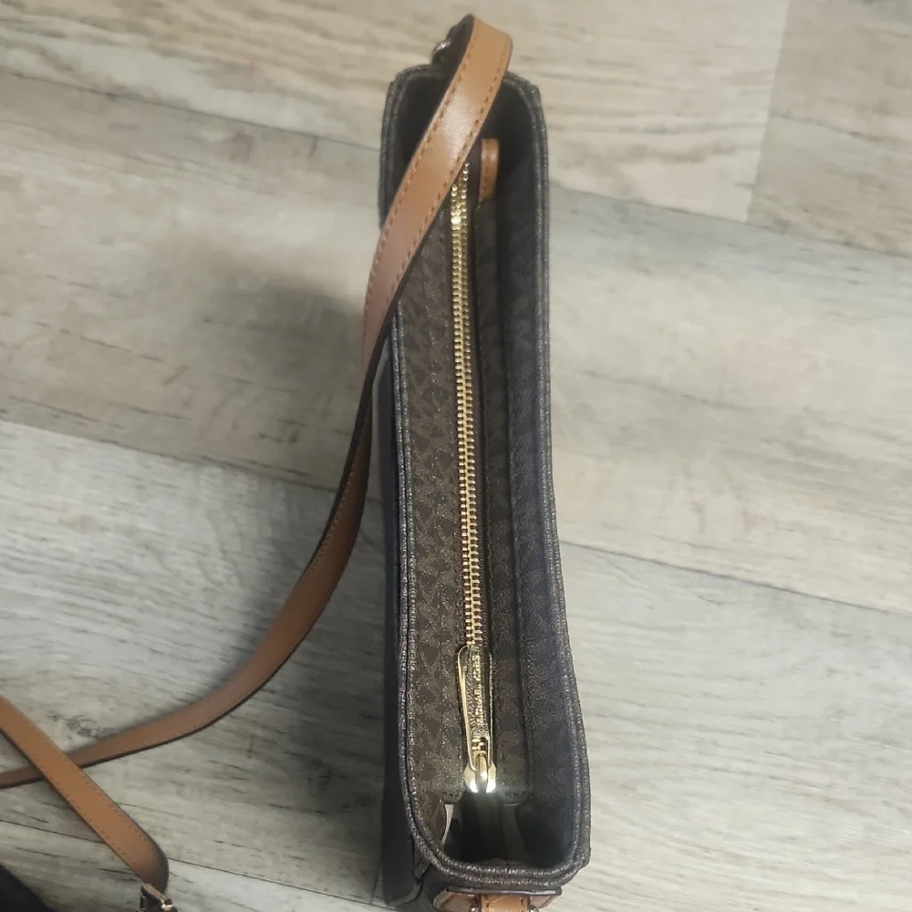 Michael Kors details closure this