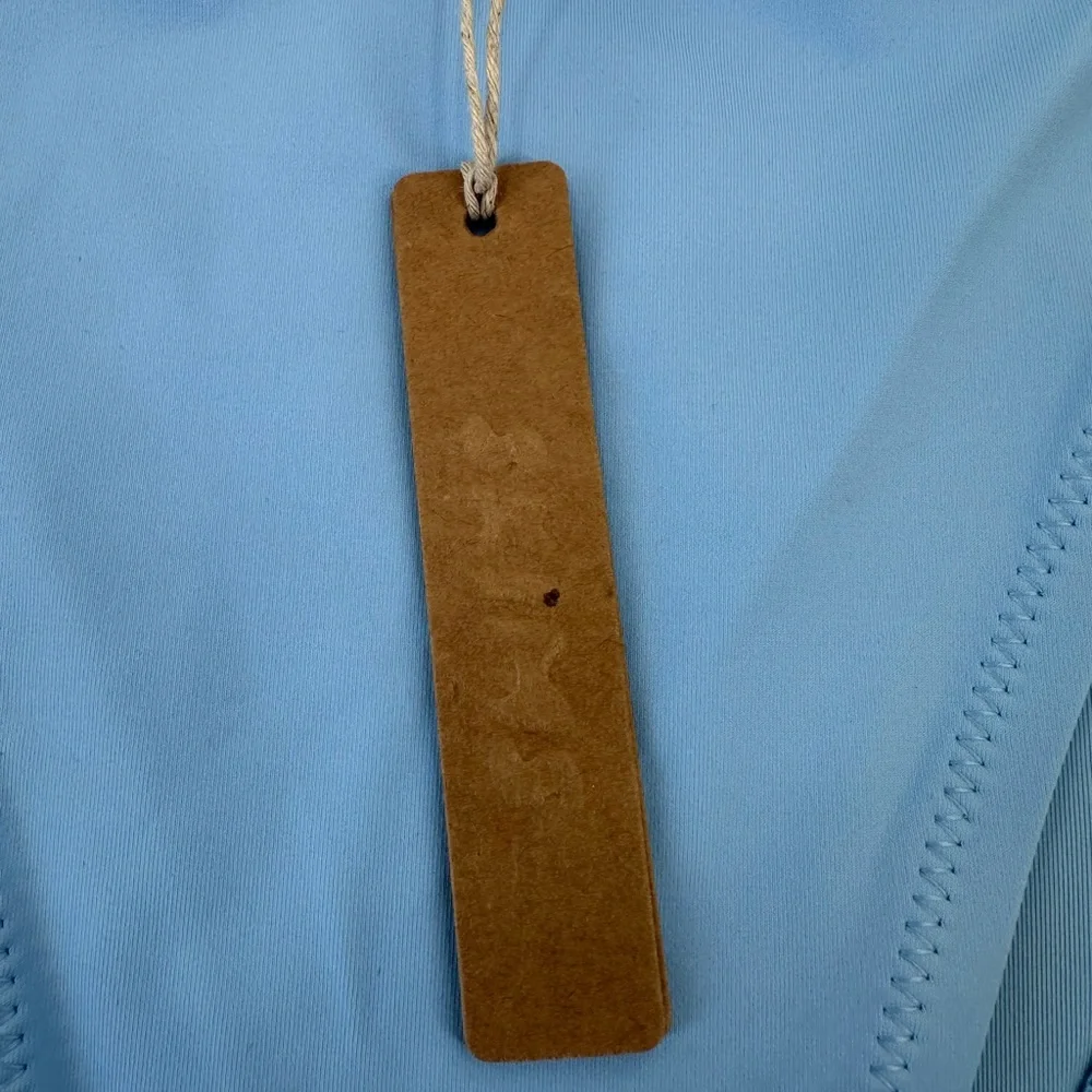 SKIMS tags liner