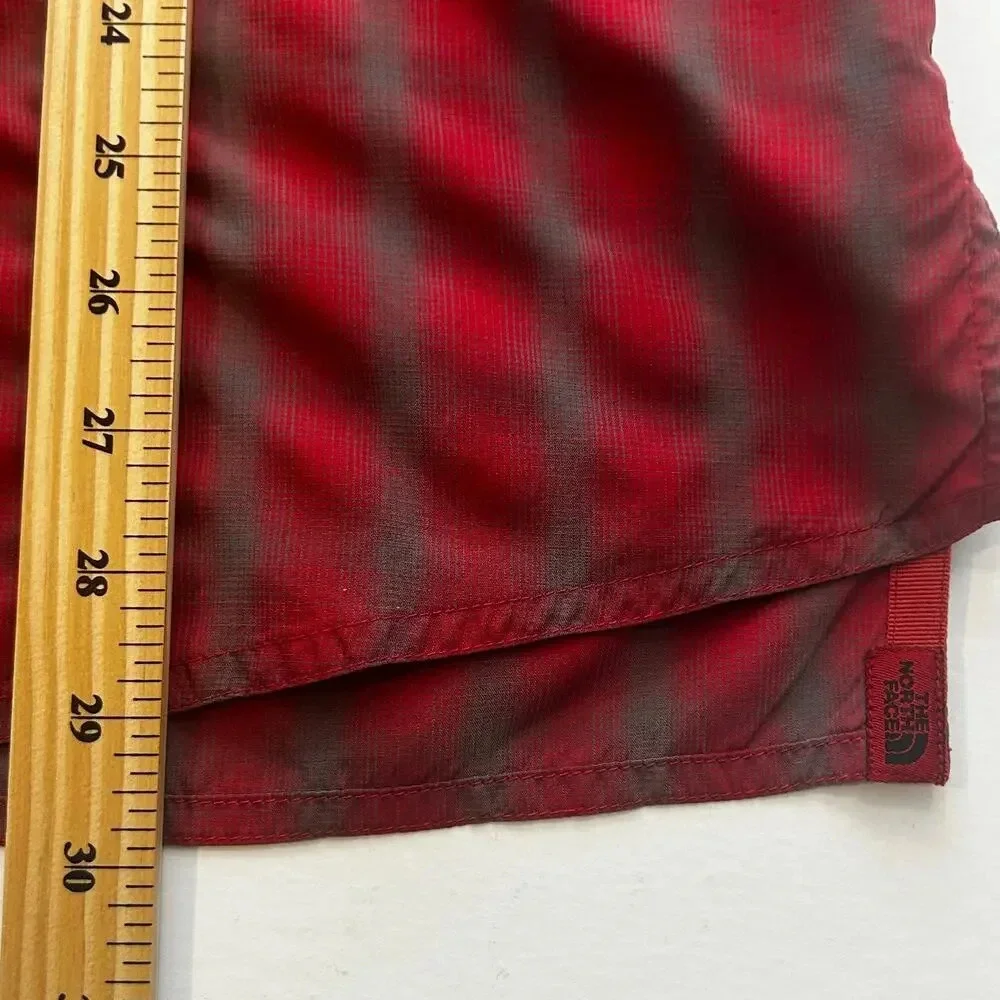 The North Face chest button can