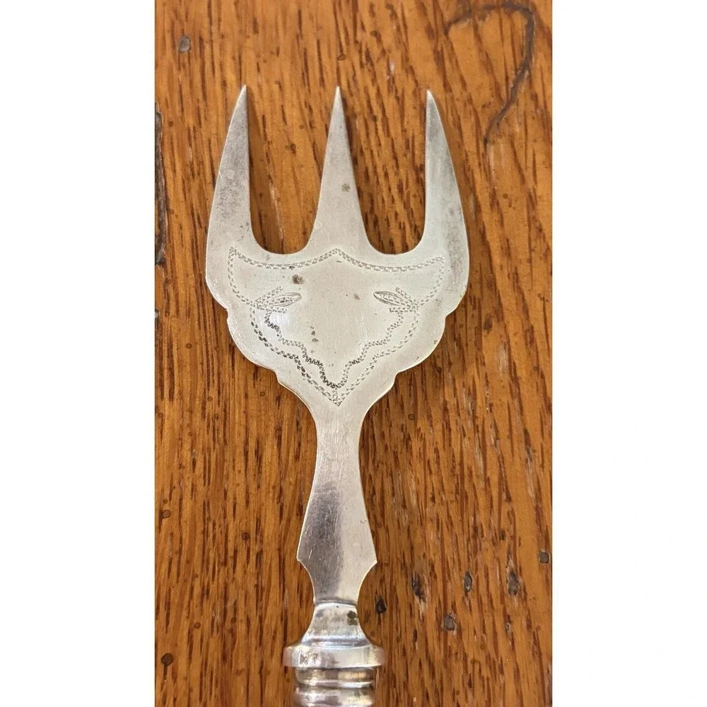 The Unbranded Brand antique silverplate