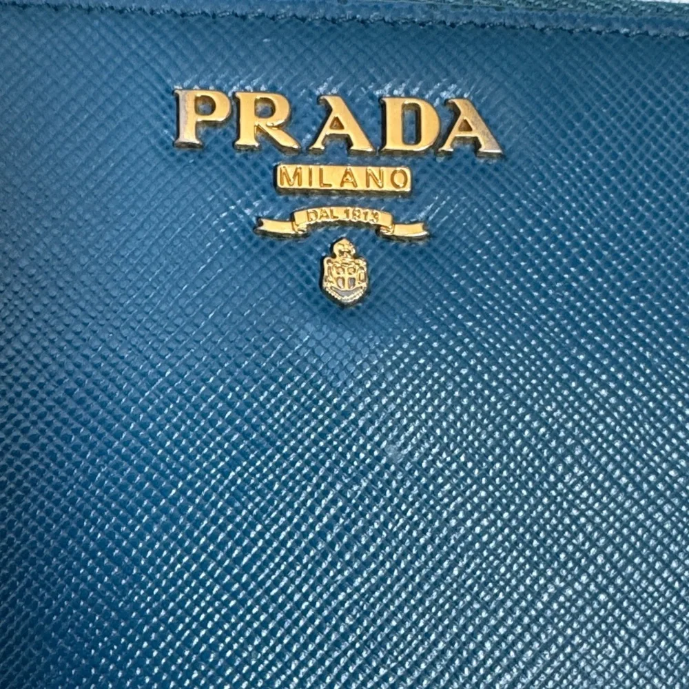 Prada returns leather