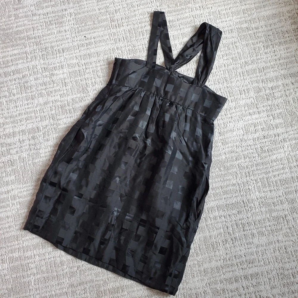 Marc By Marc Jacobs weighs 5oz