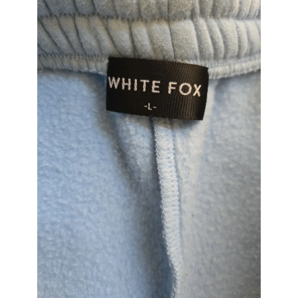 White Fox Boutique clean photos view