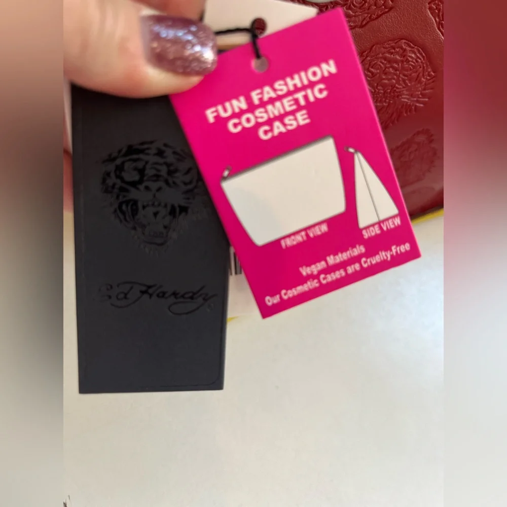 Ed Hardy features design embossed
