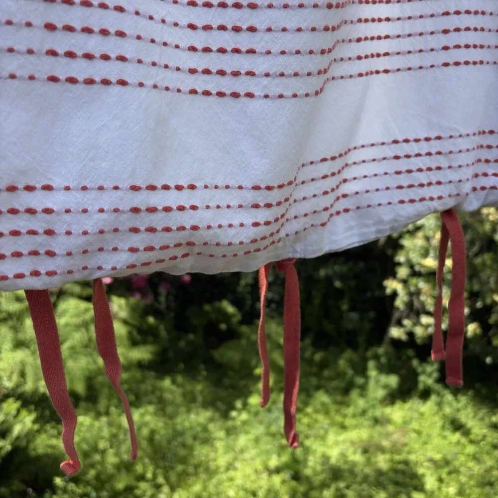West Elm stitching white orange