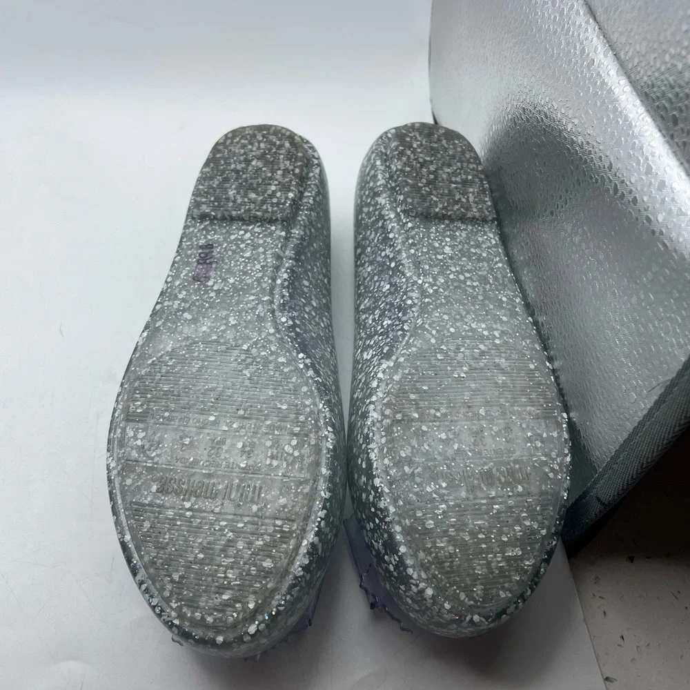 Mini Melissa gently used