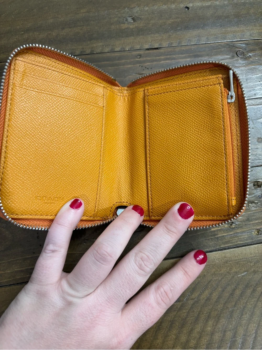 Coach compact zip