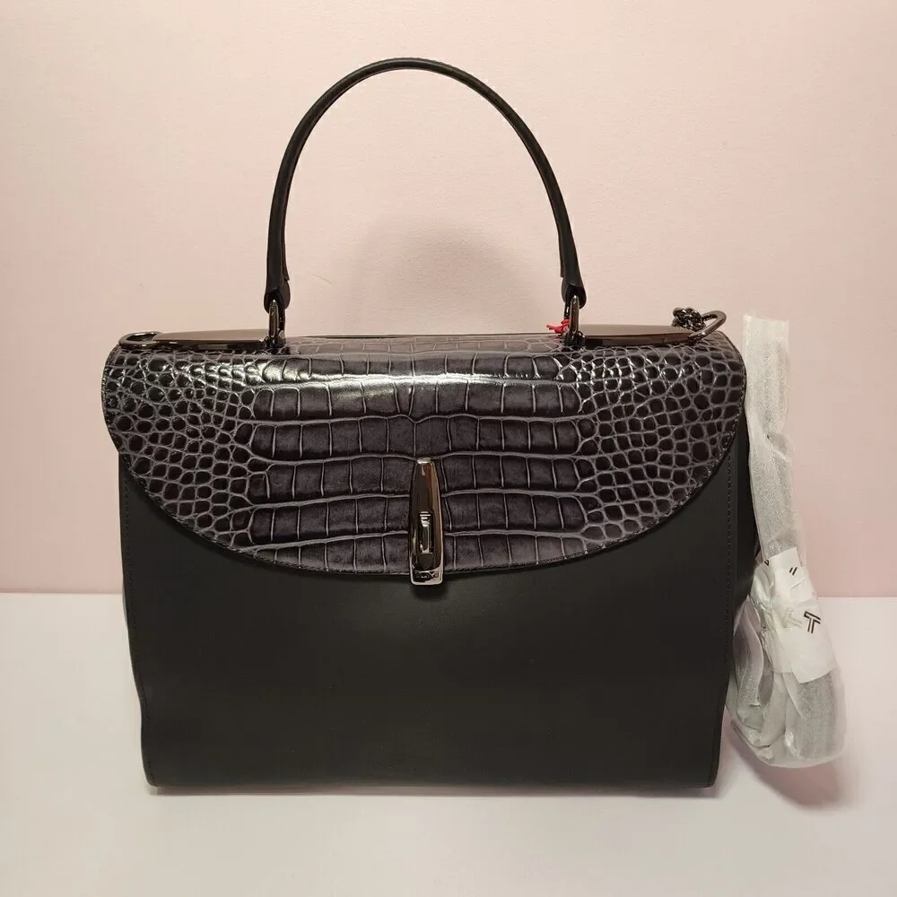 Tumi accessories* leather converts