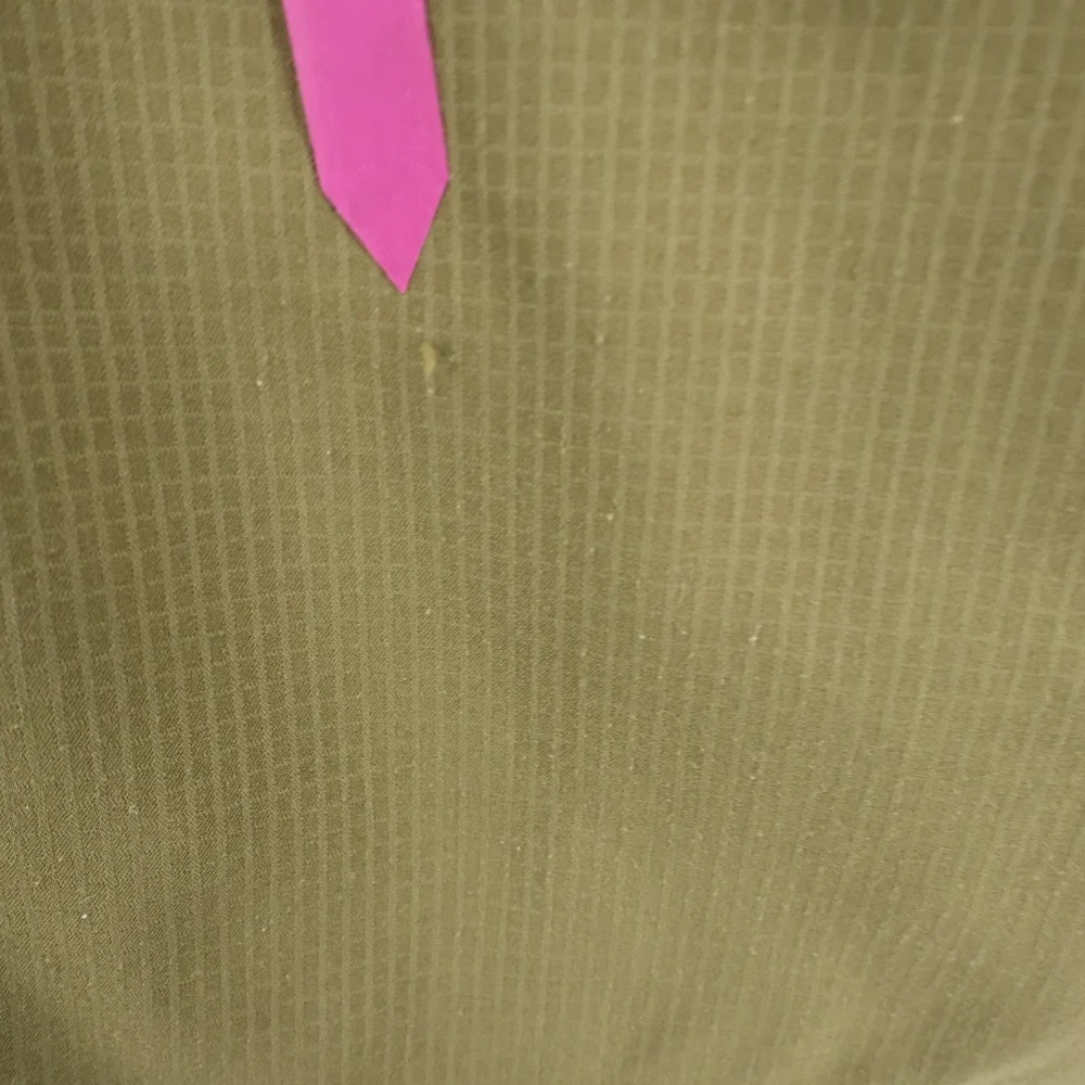 The North Face multiple stains
