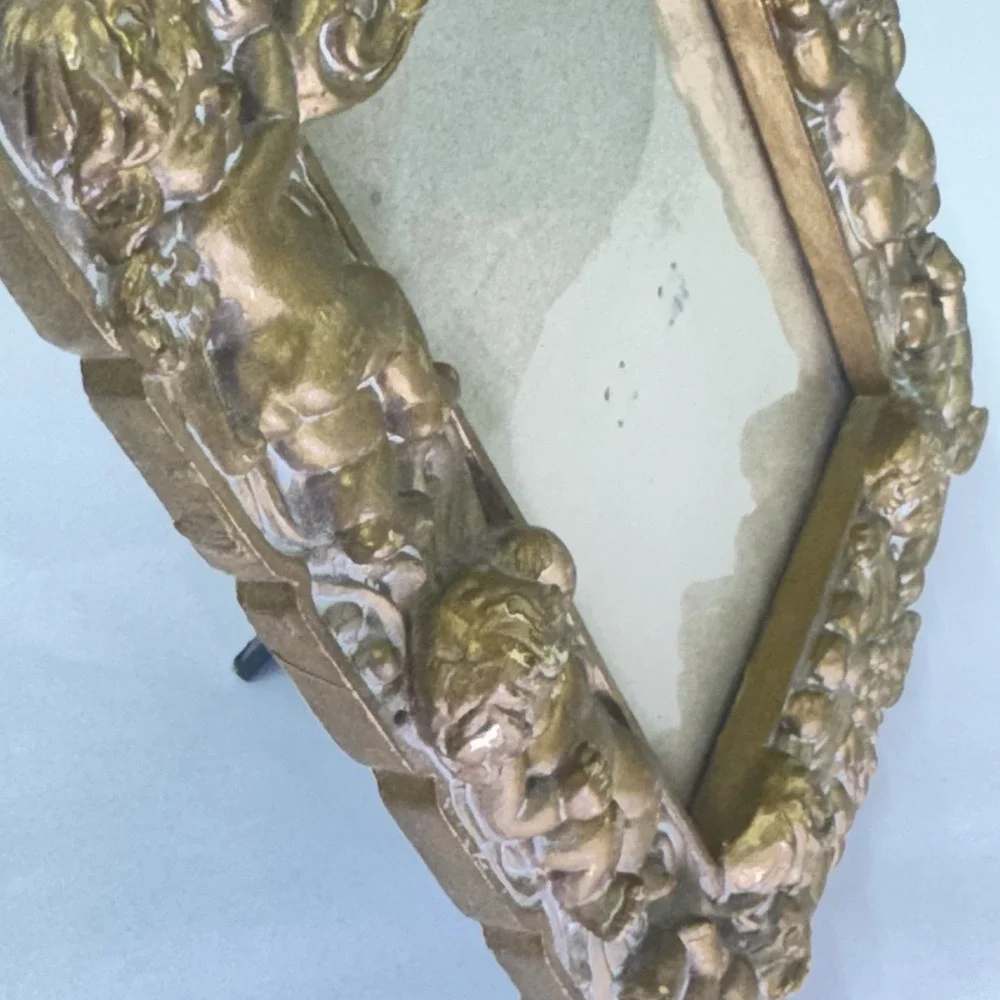 The Unbranded Brand gold cherub