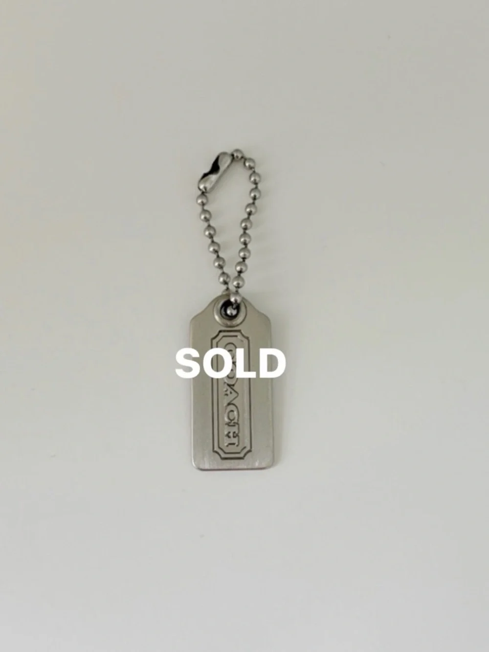 Coach Silver-tone Metal Hang Tag