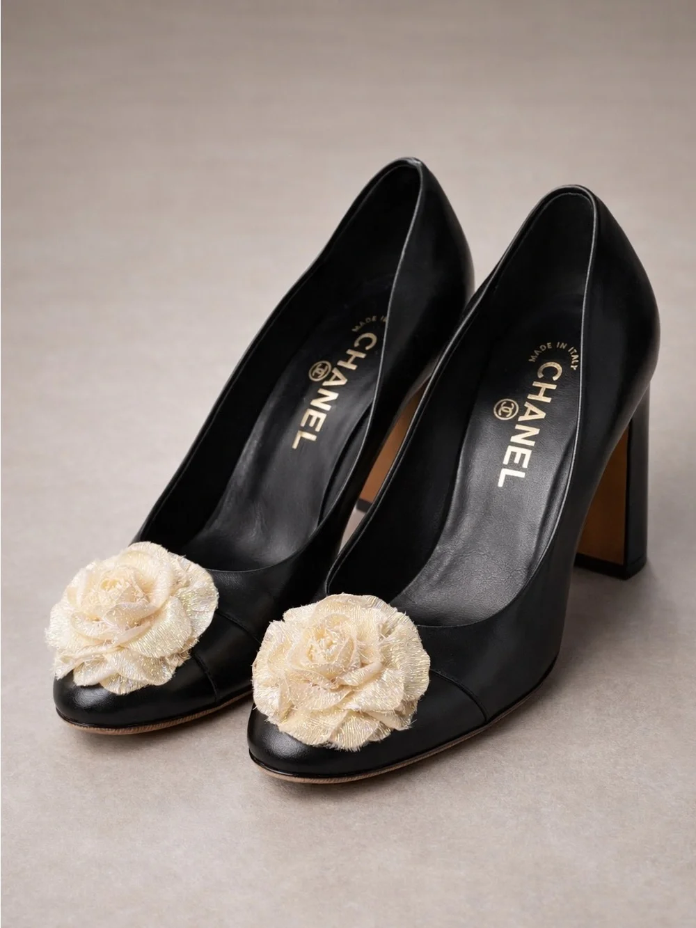 CHANEL Black Leather Patent Pumps with Cream Camellia Accent CC Logo Size 36C