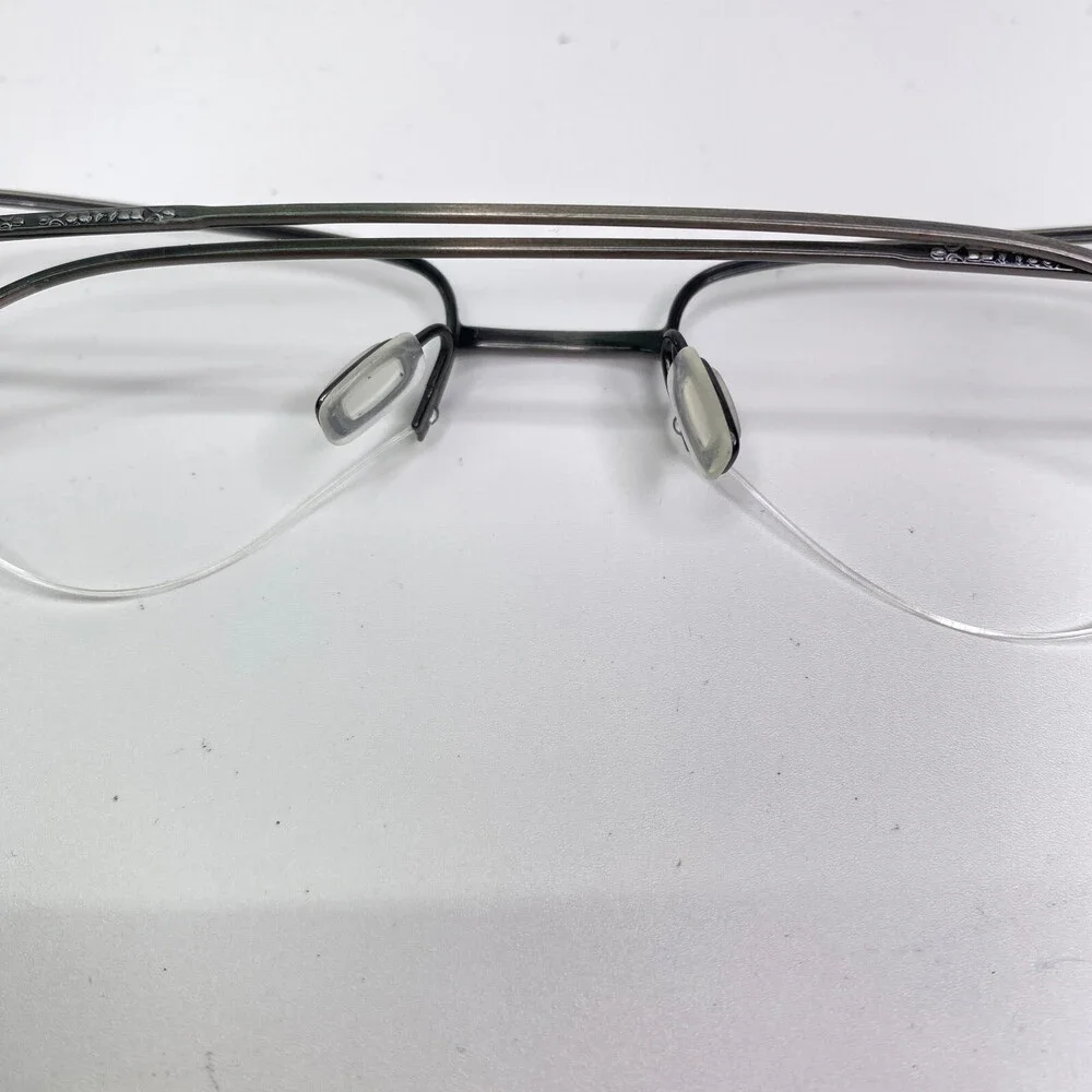 Oliver Peoples please message