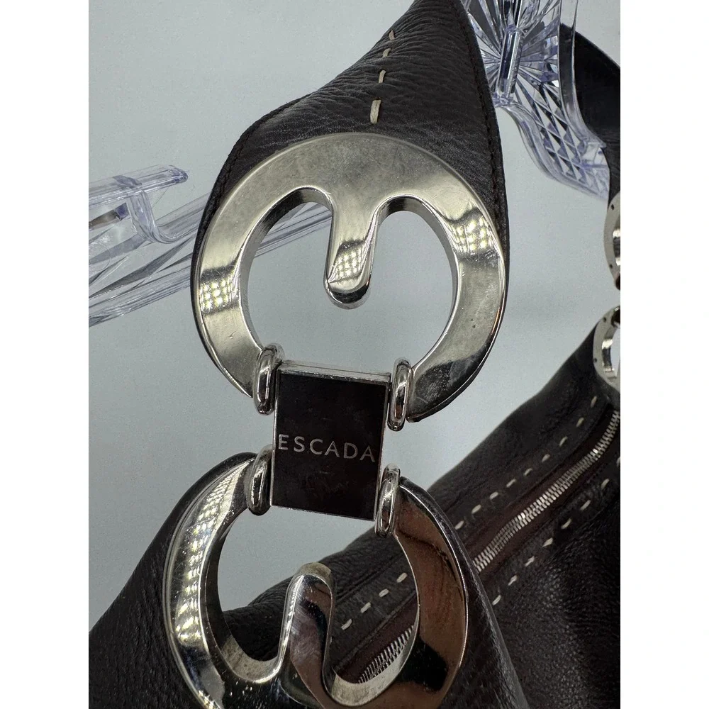 Escada striking whipstitch are