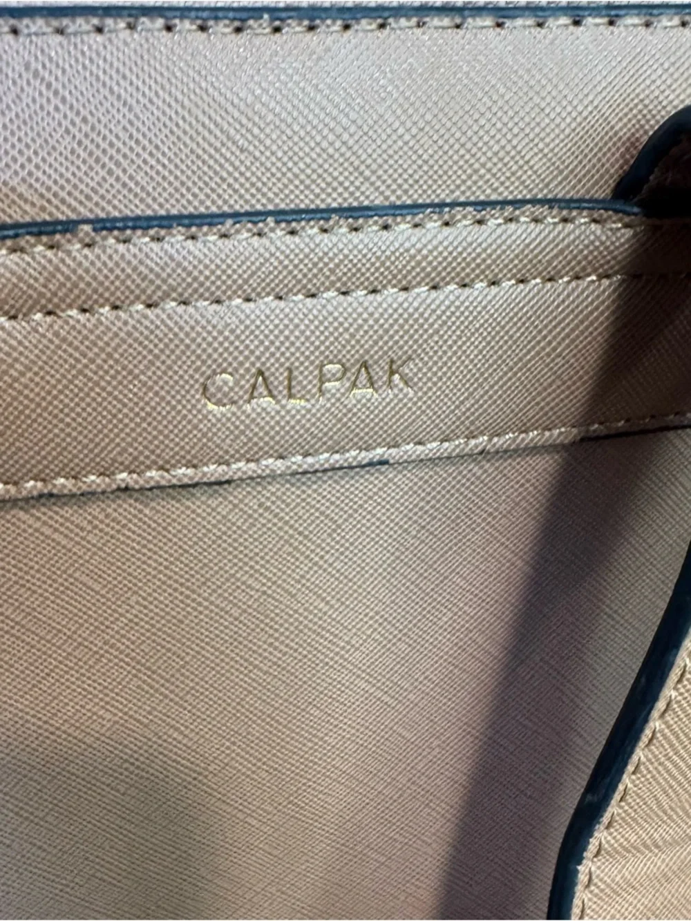 Calpak backpack tan