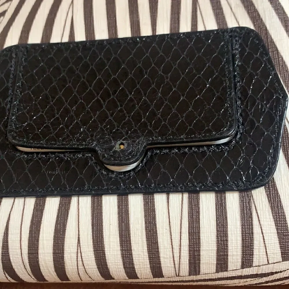 henri bendel coated canvas