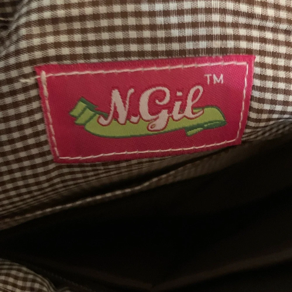N. Gil never monogrammed