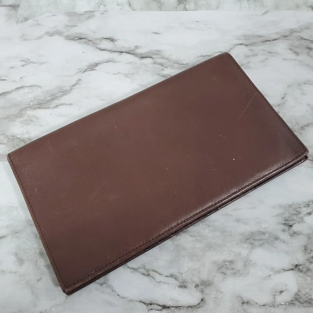 Tumi brown leather