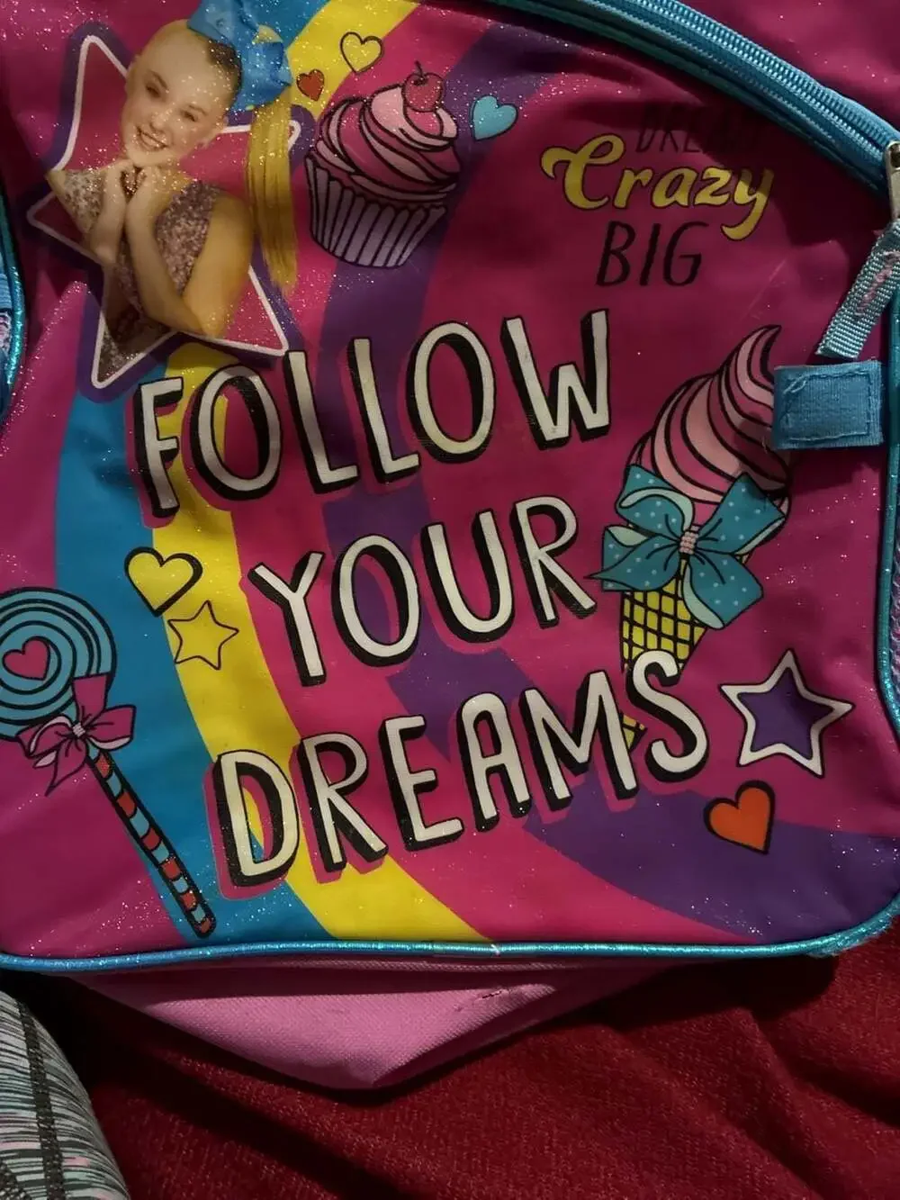 JoJo Siwa damage zipper