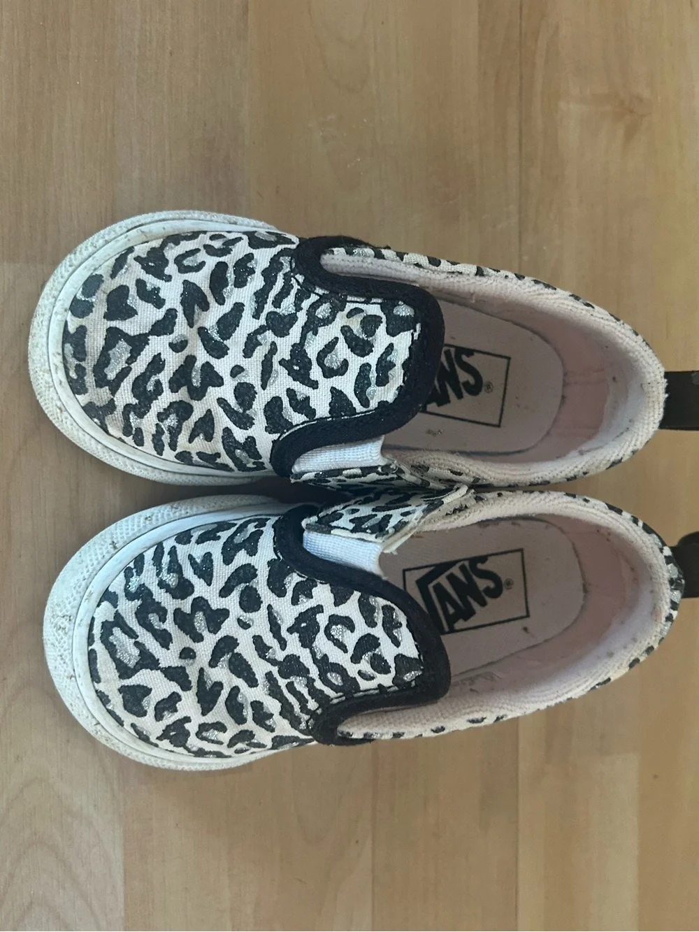 Vans Baby Slip-On Sneakers in Black and White Leopard Print