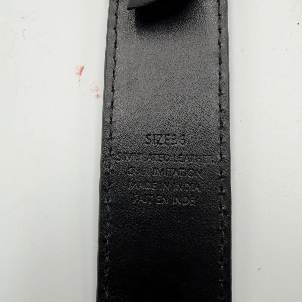 True Religion small holes punched