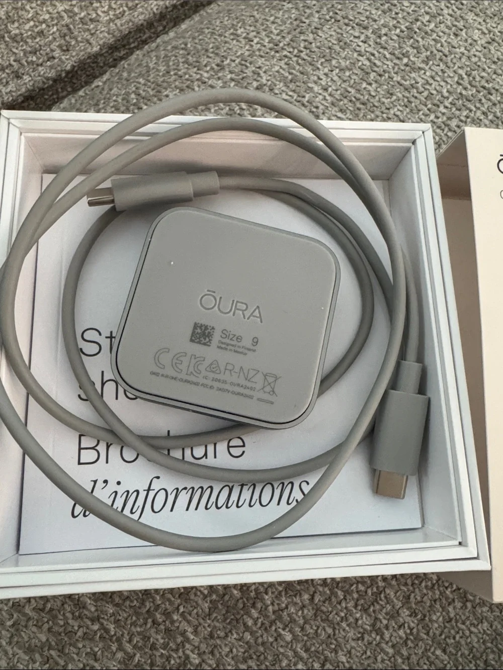 Oura designed charging light