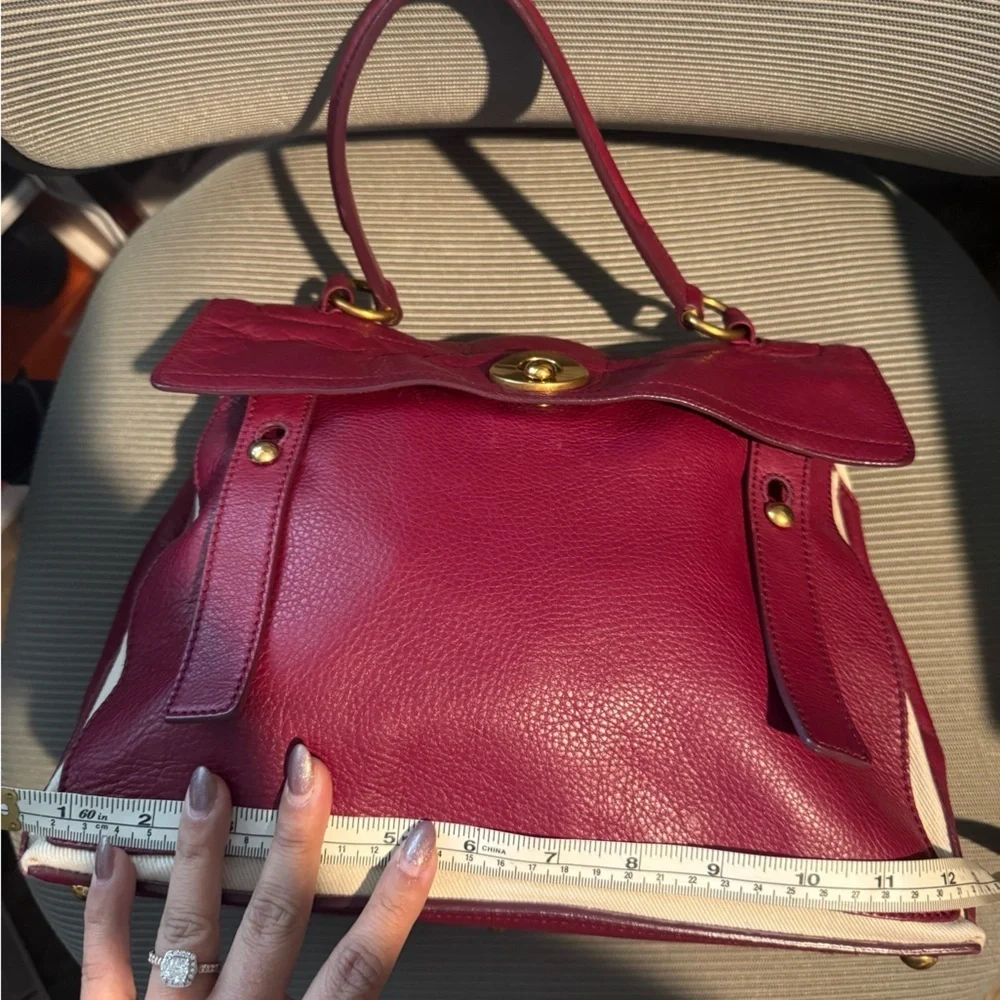 Yves Saint Laurent gold small tone