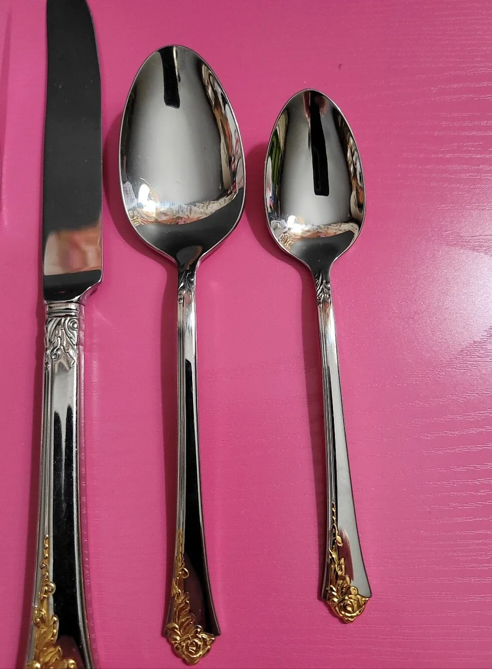 Oneida gold soup spoon
