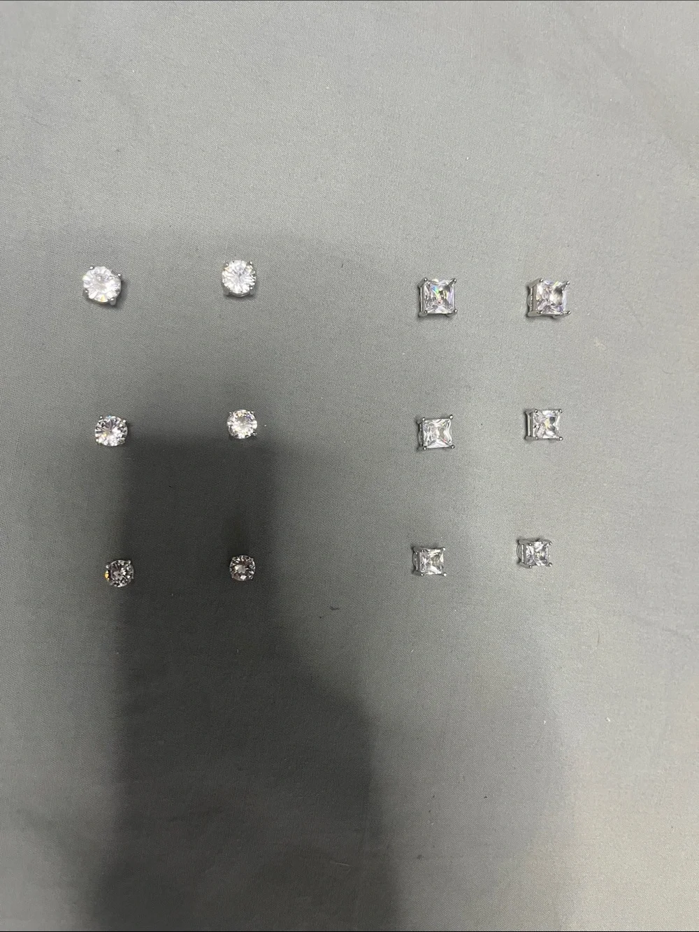 A 6 set of magnetic moissanite earring studs