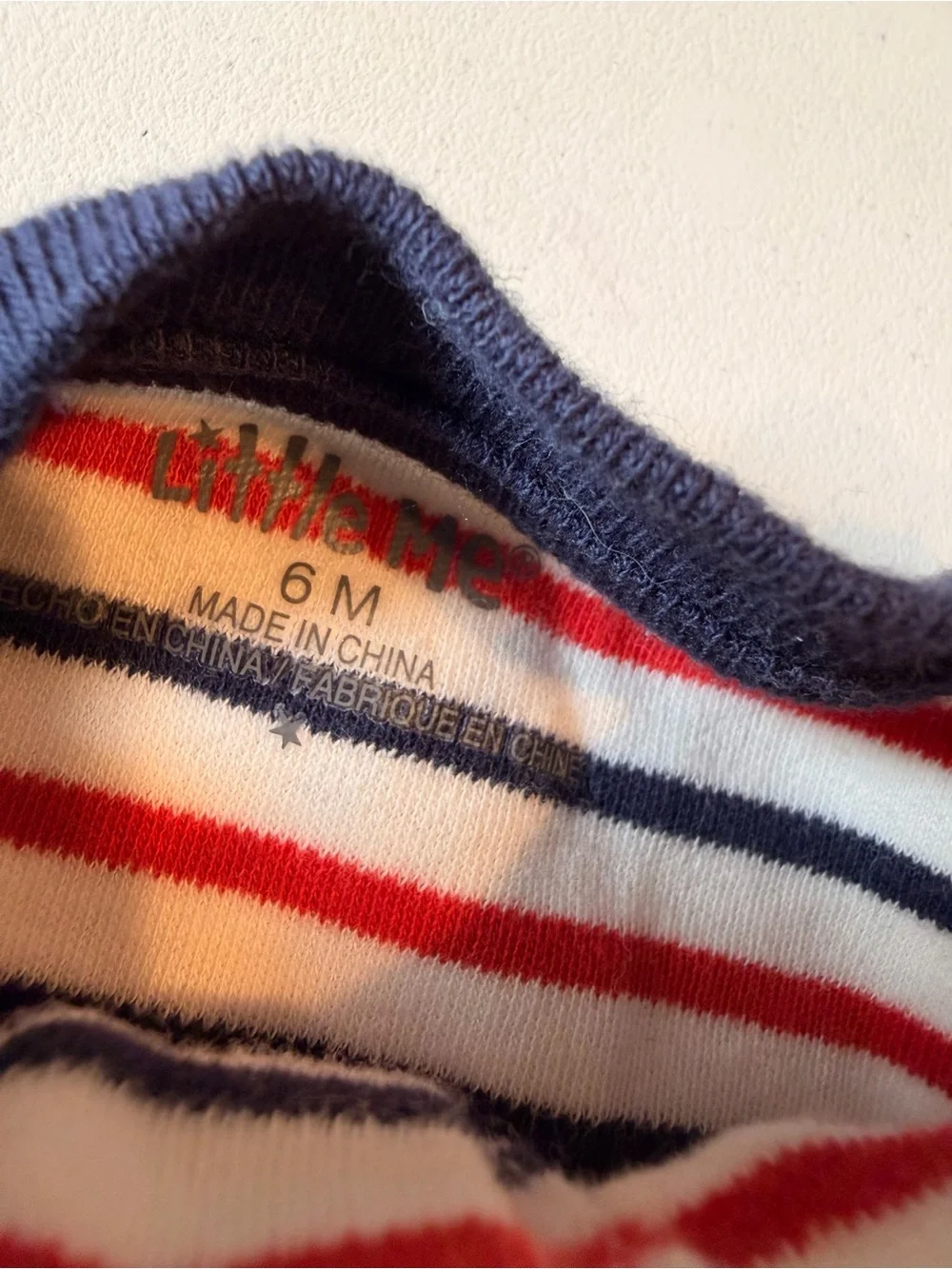 Little Me holes red cream