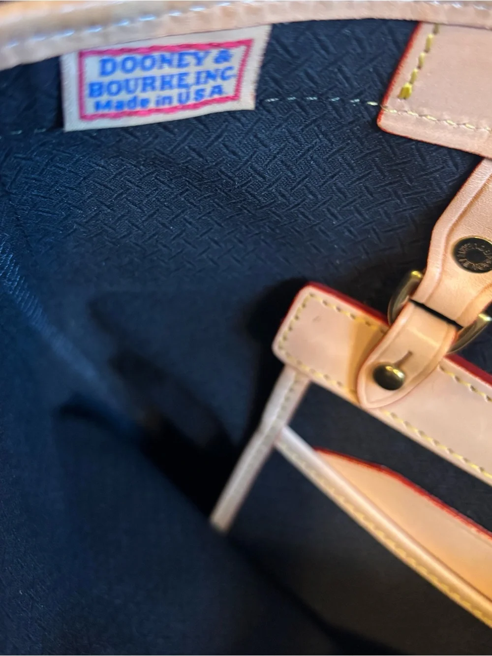 Dooney & Bourke ** buckle turnaround