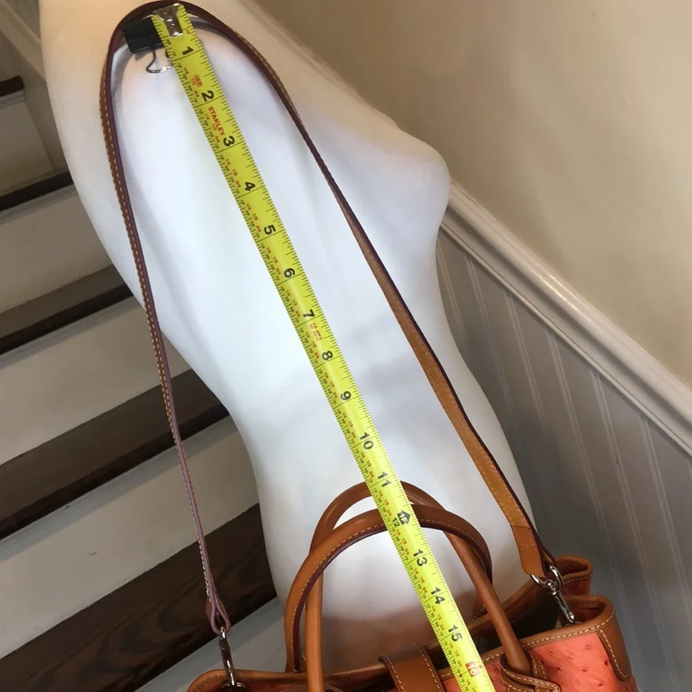 Dooney & Bourke red features display