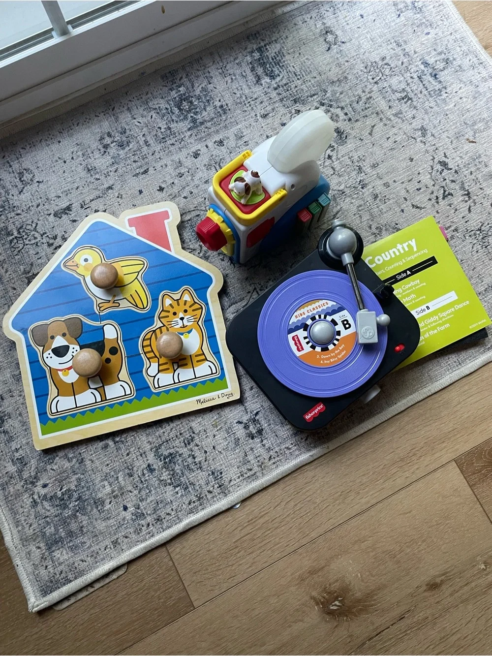 Bundle of Fisher Price Toys and Melissa and Doug Puzzle