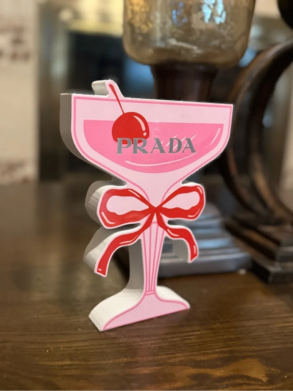 Prada finish logo bow