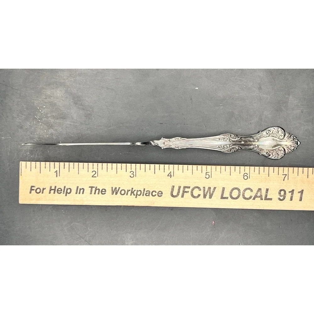Rogers & Hamilton scrollwork type