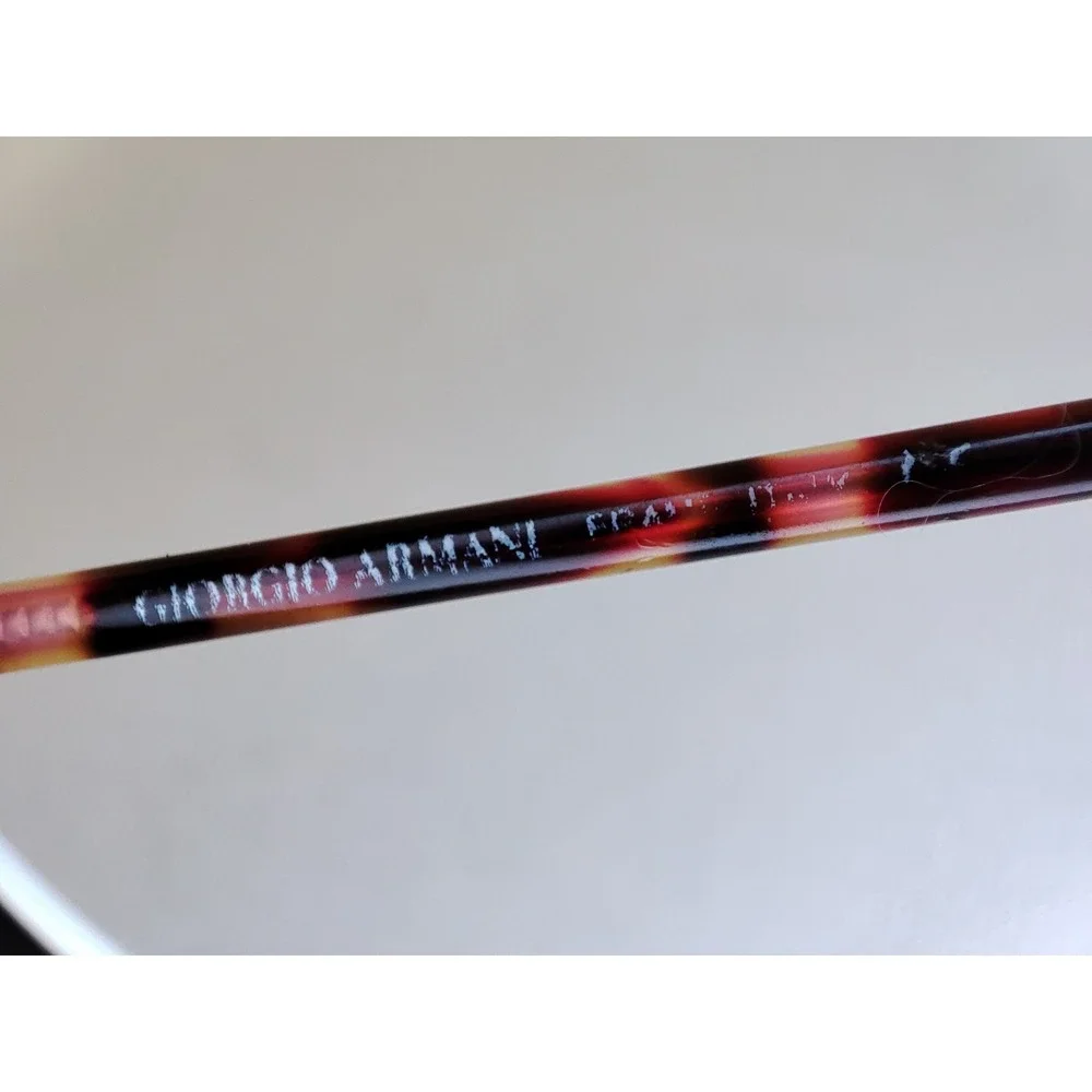 Giorgio Armani firm report due