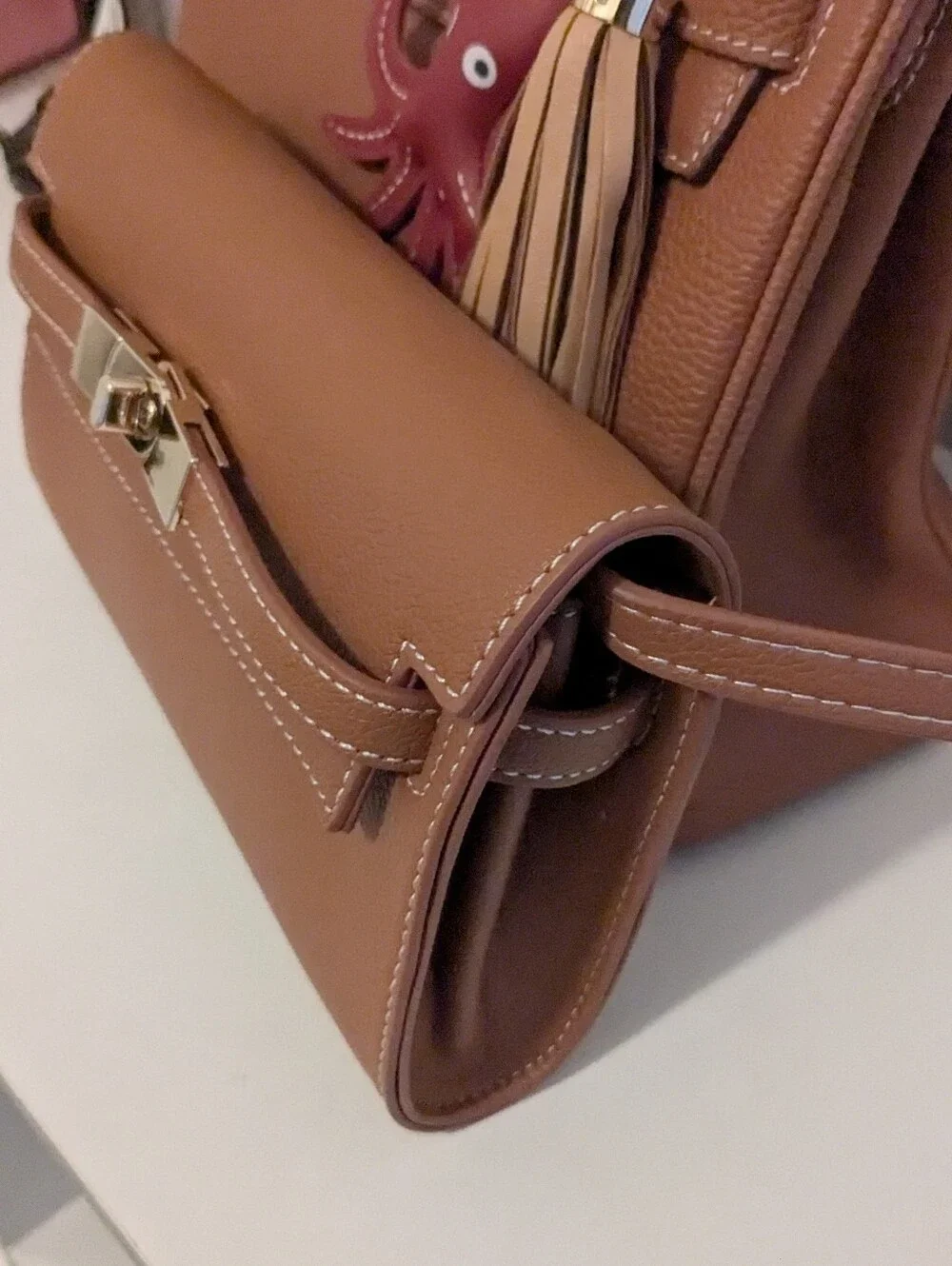 The Unbranded Brand sleek tan