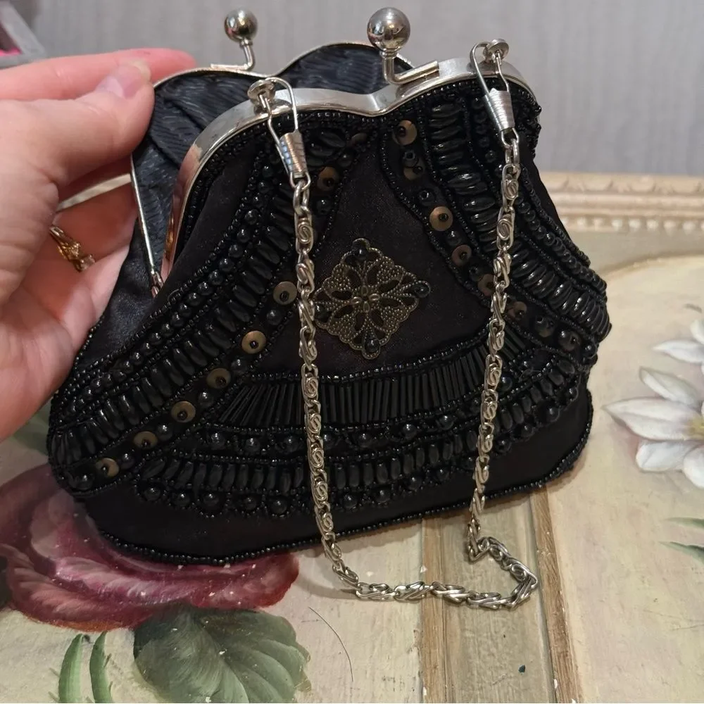 Source Unknown heavily beaded