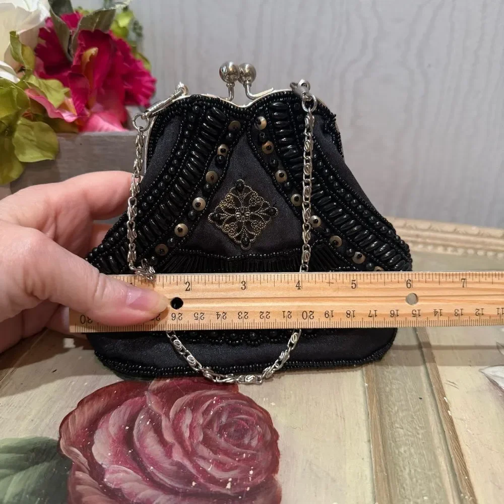 Source Unknown heavily beaded