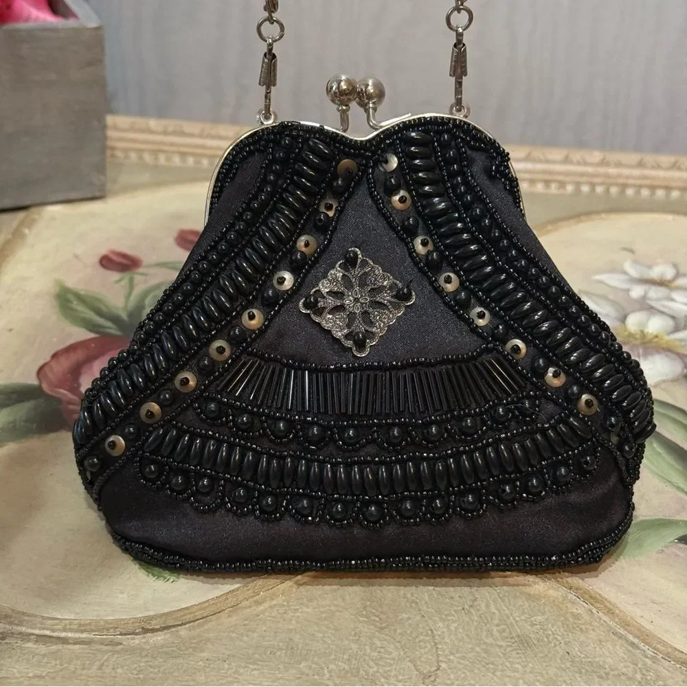 Source Unknown heavily beaded