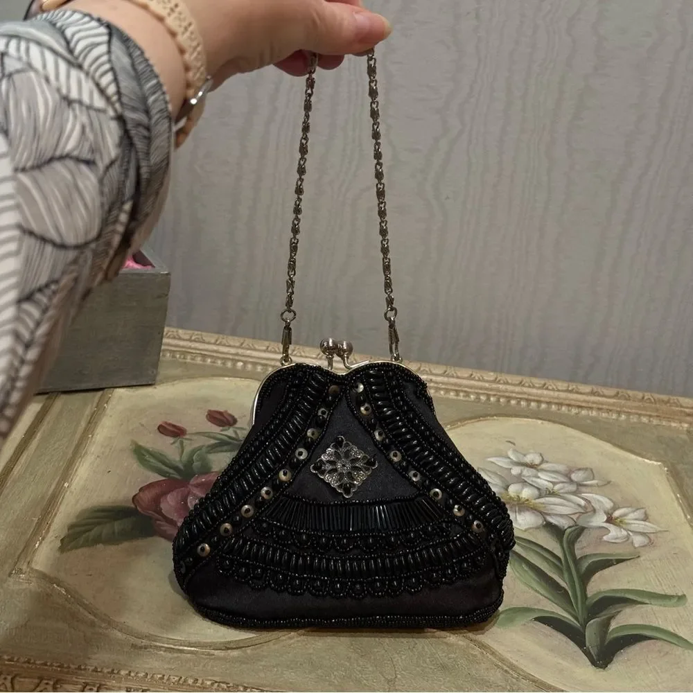 Source Unknown heavily beaded