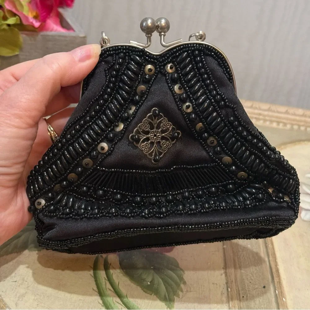 Source Unknown heavily beaded