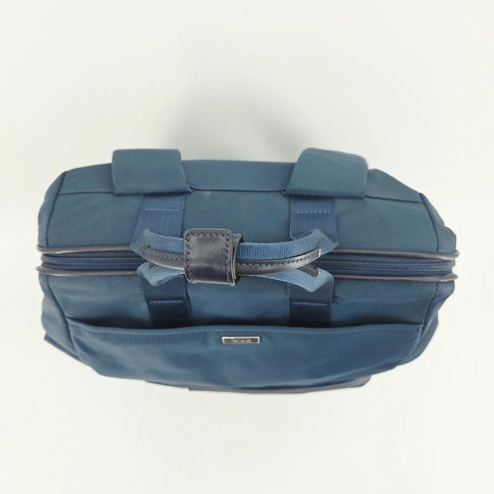 Tumi owned zip