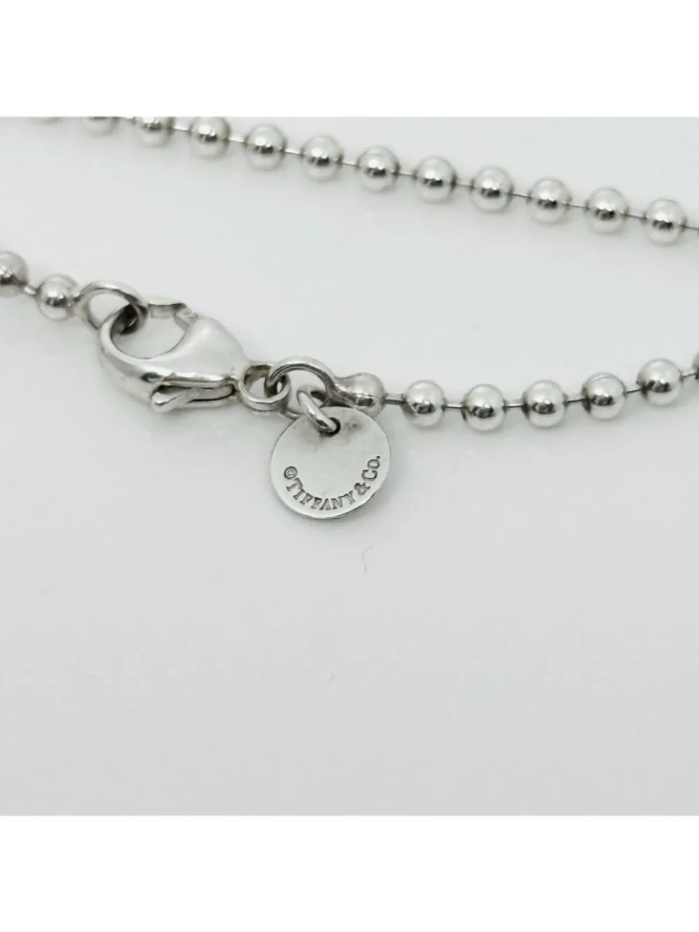 Tiffany & Co. guaranteed 100%