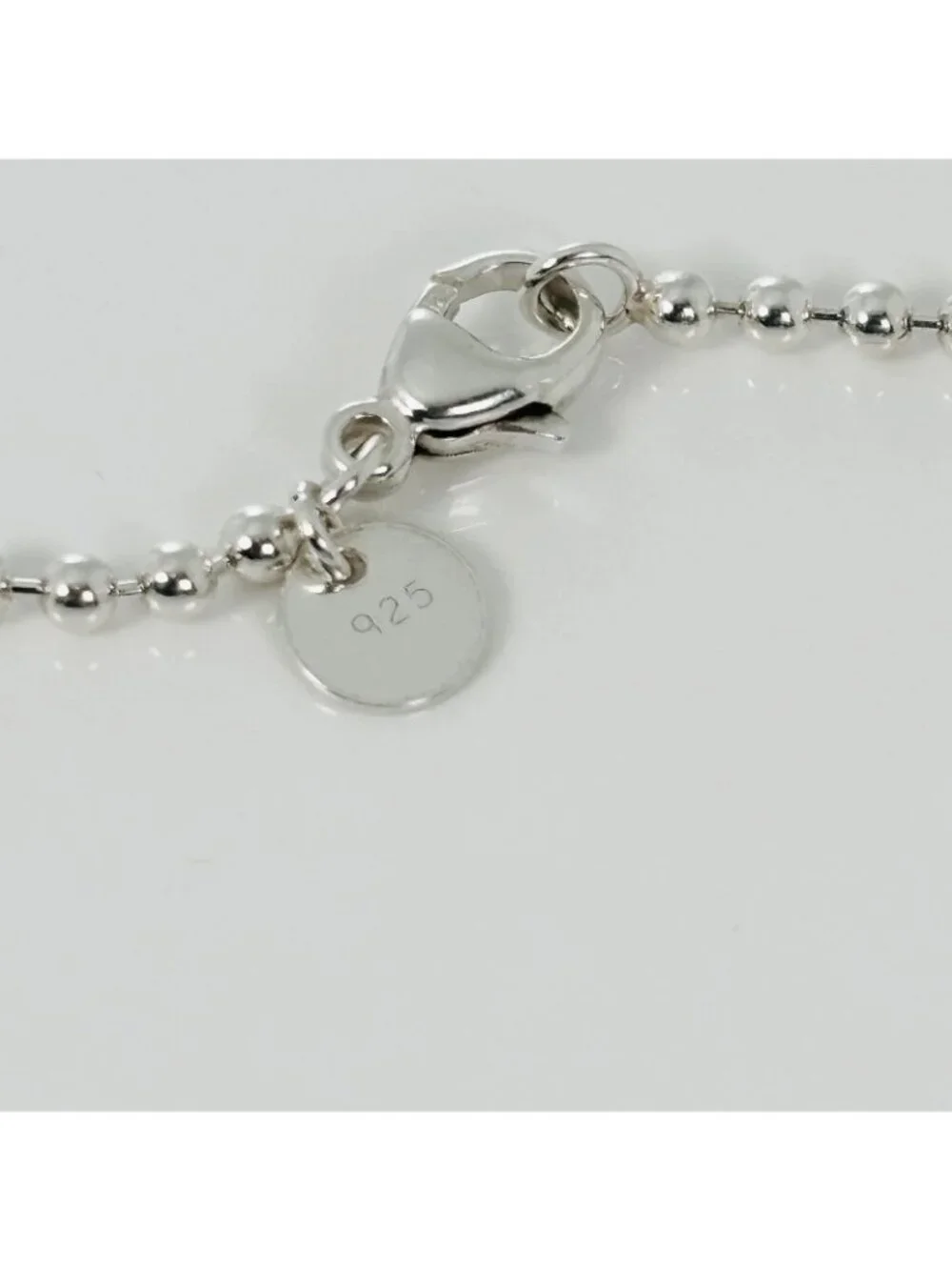 Tiffany & Co. guaranteed 100%