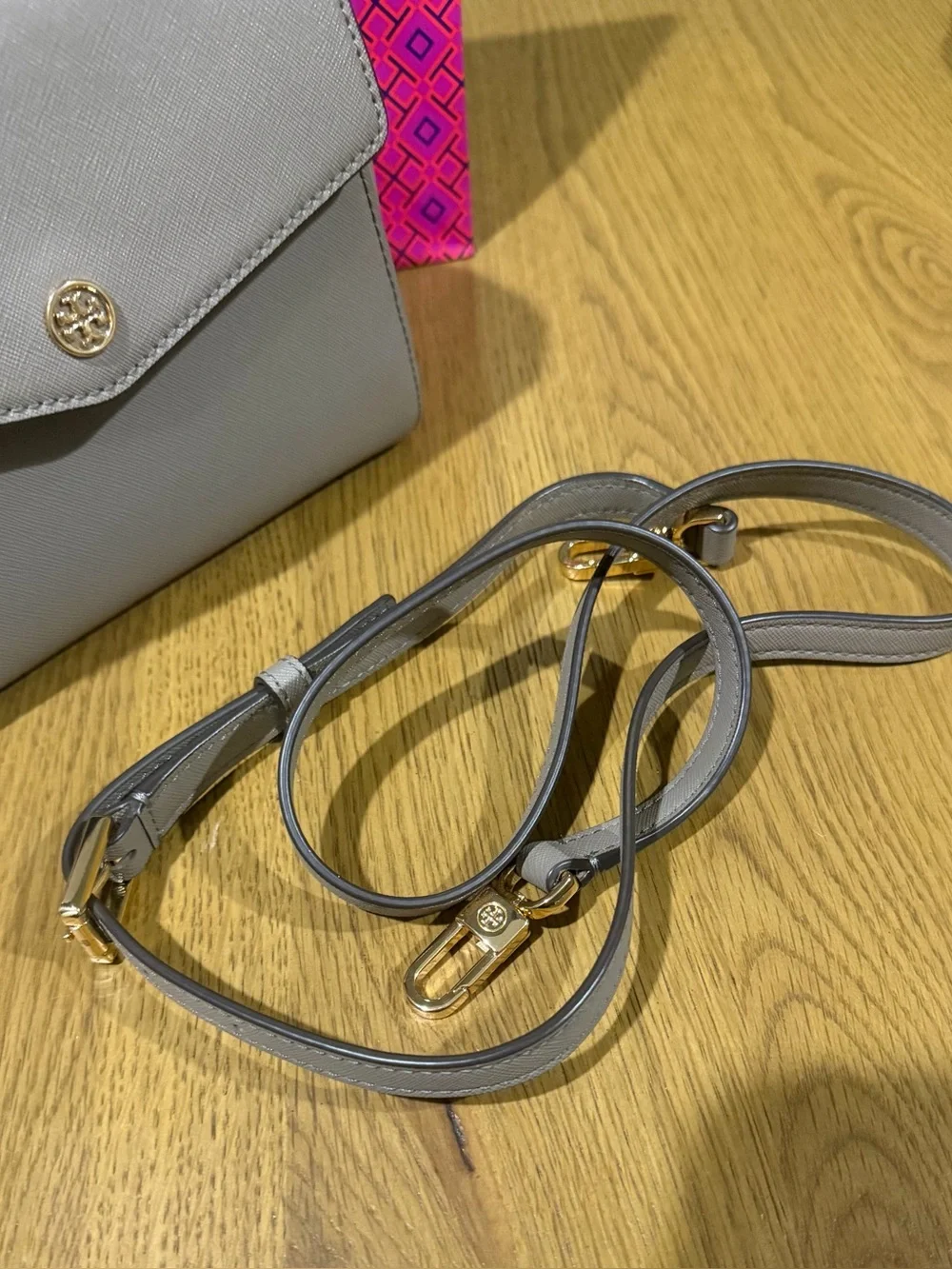 Tory Burch stains dust some